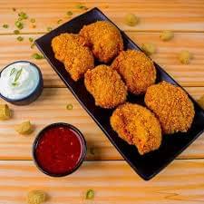 Crispy Golden Kurkure Momos with Spicy Dips